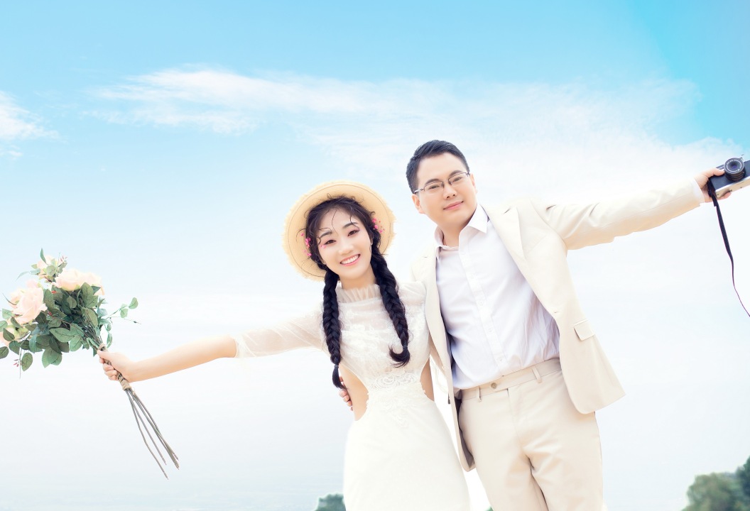 陳曦雄 朱婧